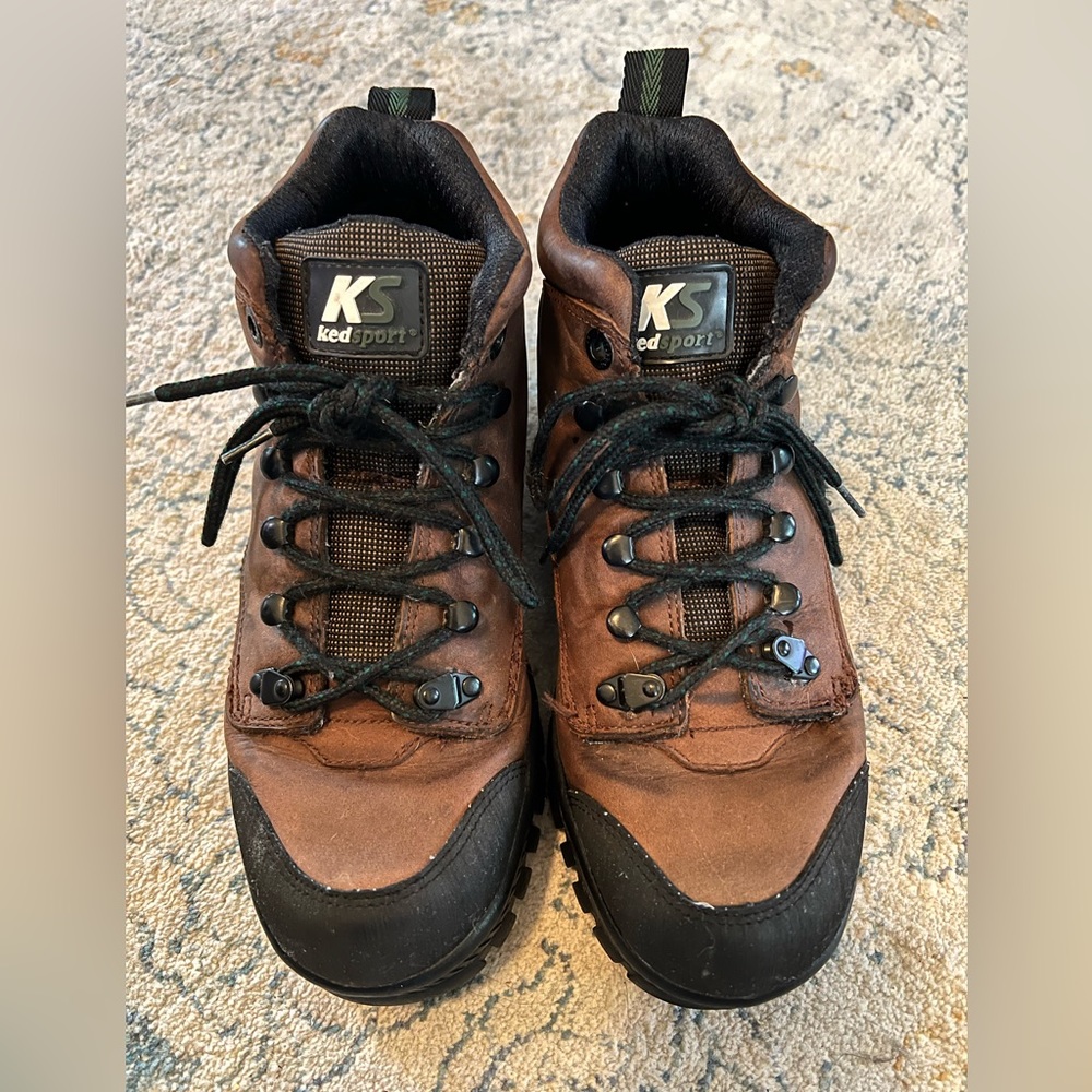 Barely used- hiking boots, great tread, laces adjust higher to ankle if needed